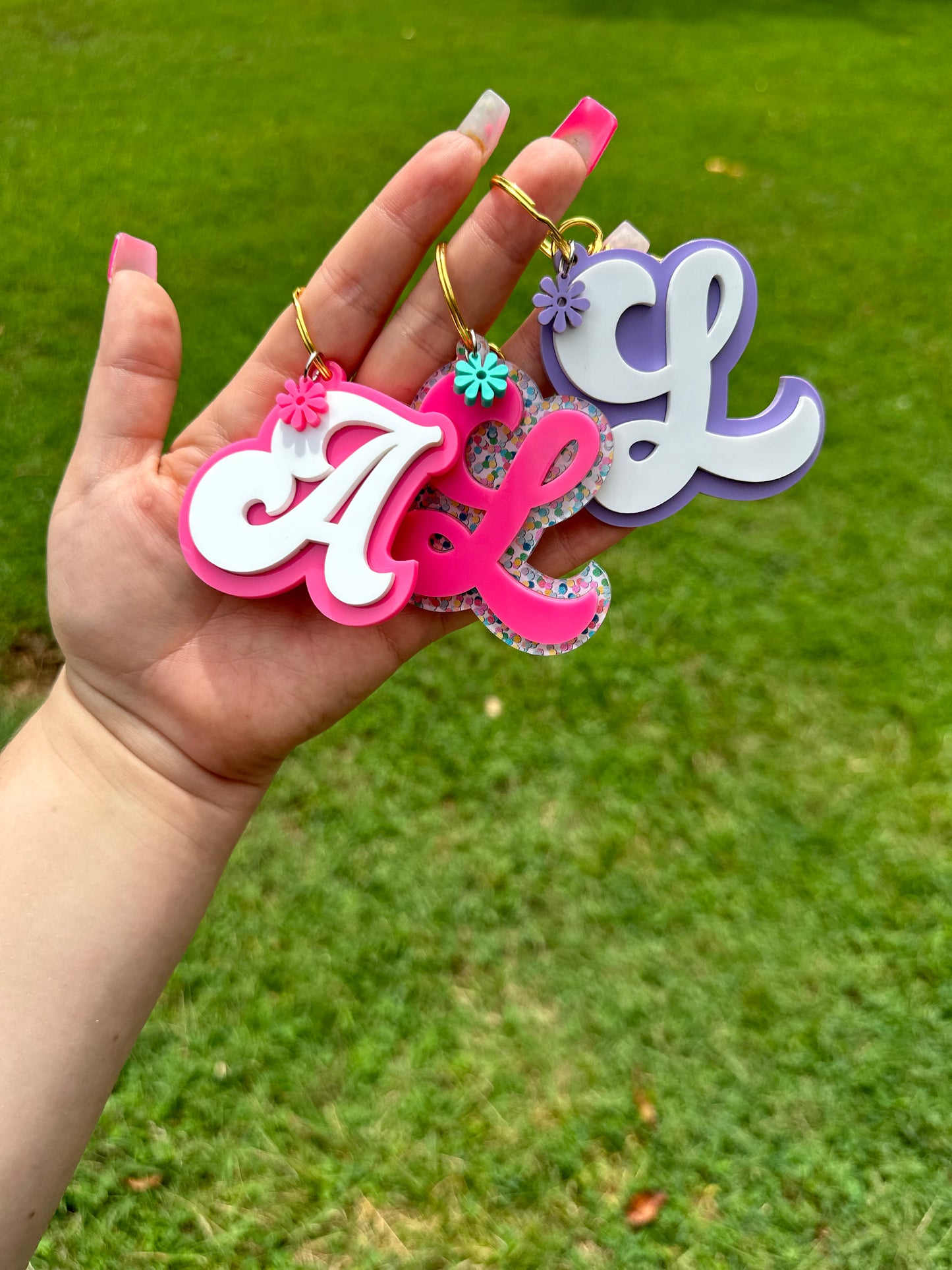 Initial bag tag with flower charm